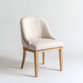 Silla de comedor tapizada en tela beige con patas de madera clara 50x58x90 cm - detalles de tachuelas decorativas - estilo clásico contemporáneo para comedor